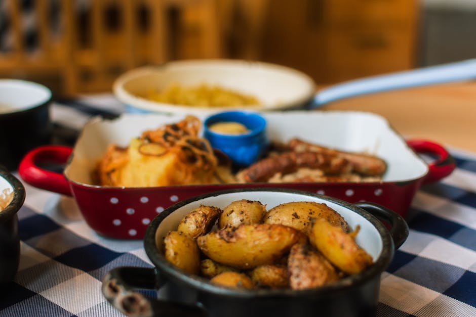Traditional Belgian dishes Brussels — close-up of savory roasted potatoes and sausages perfect for rustic meal