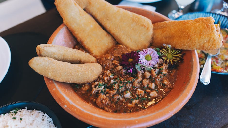 Traditional Belgian dishes Brussels — flavorful traditional dish with breaded sides and vibrant garnish in rustic bowl