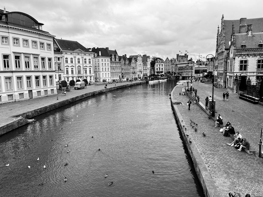 Ghent day trip from Brussels — best black and white view of scenic canal and historic buildings in Ghent Belgium