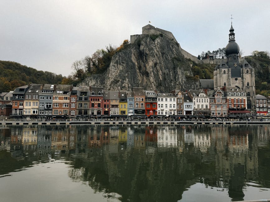 Dinant day trip from Brussels — best colorful houses and church along Meuse River in Dinant Wallonia Belgium