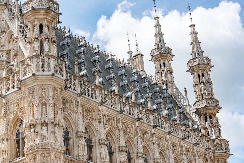 Leuven day trip from Brussels — best intricate Gothic architecture of Leuven Town Hall showcasing ornamental details