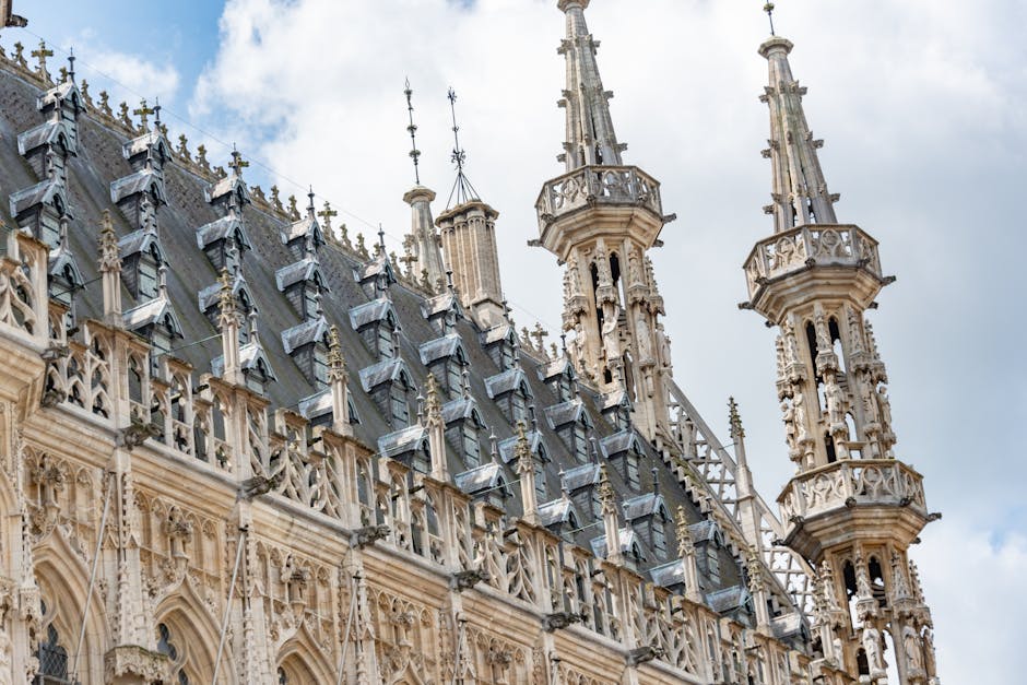 Leuven day trip from Brussels — best detailed view of ornate Gothic spires and facade of Leuven historic town hall