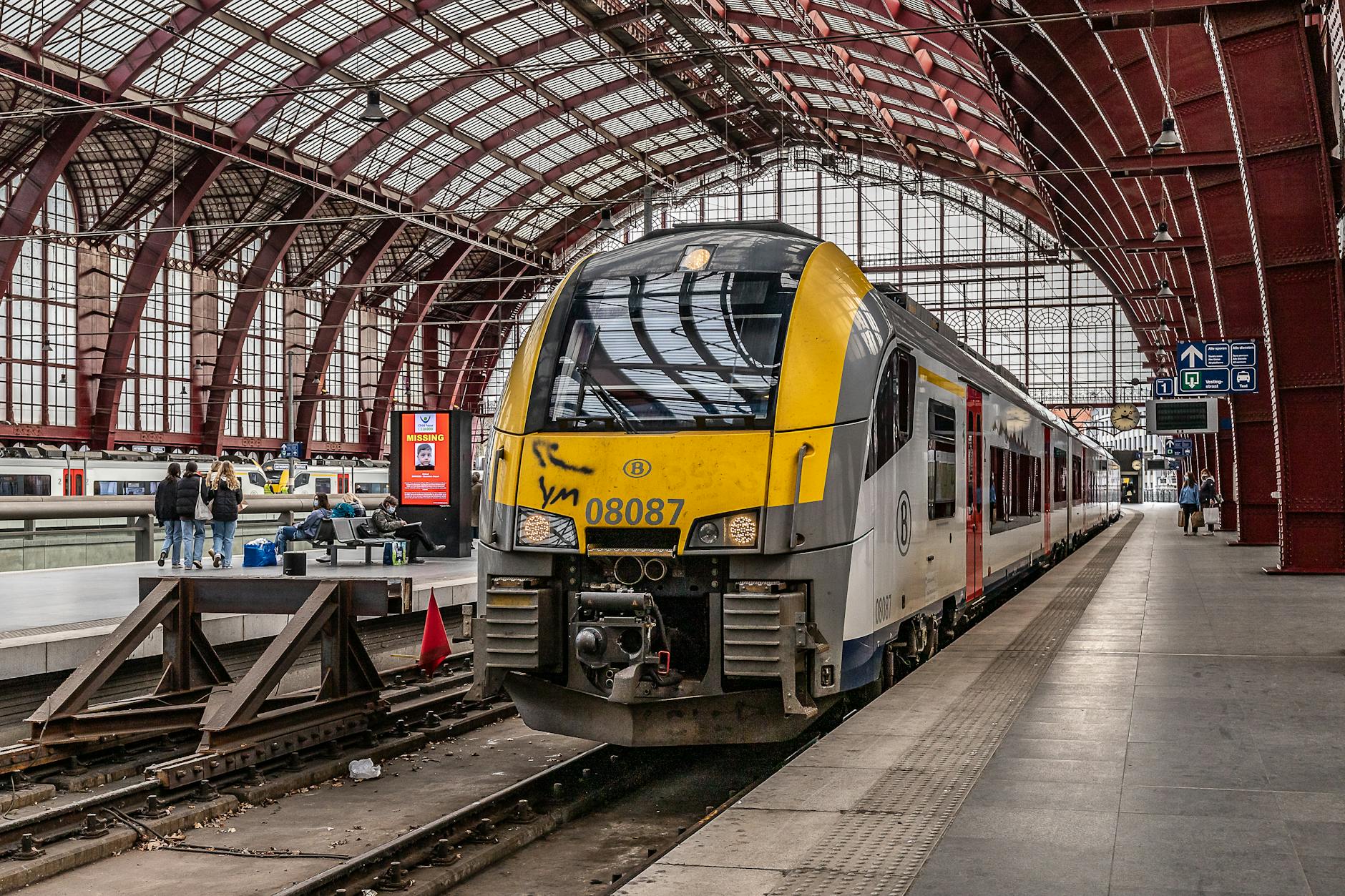 Belgian train at railway station platform for day trips from Brussels