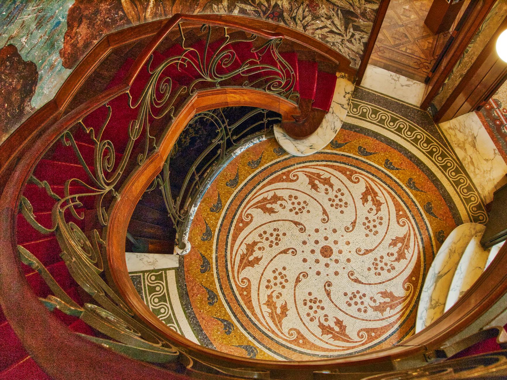 Art Nouveau building facade in Brussels with curved ironwork and glass