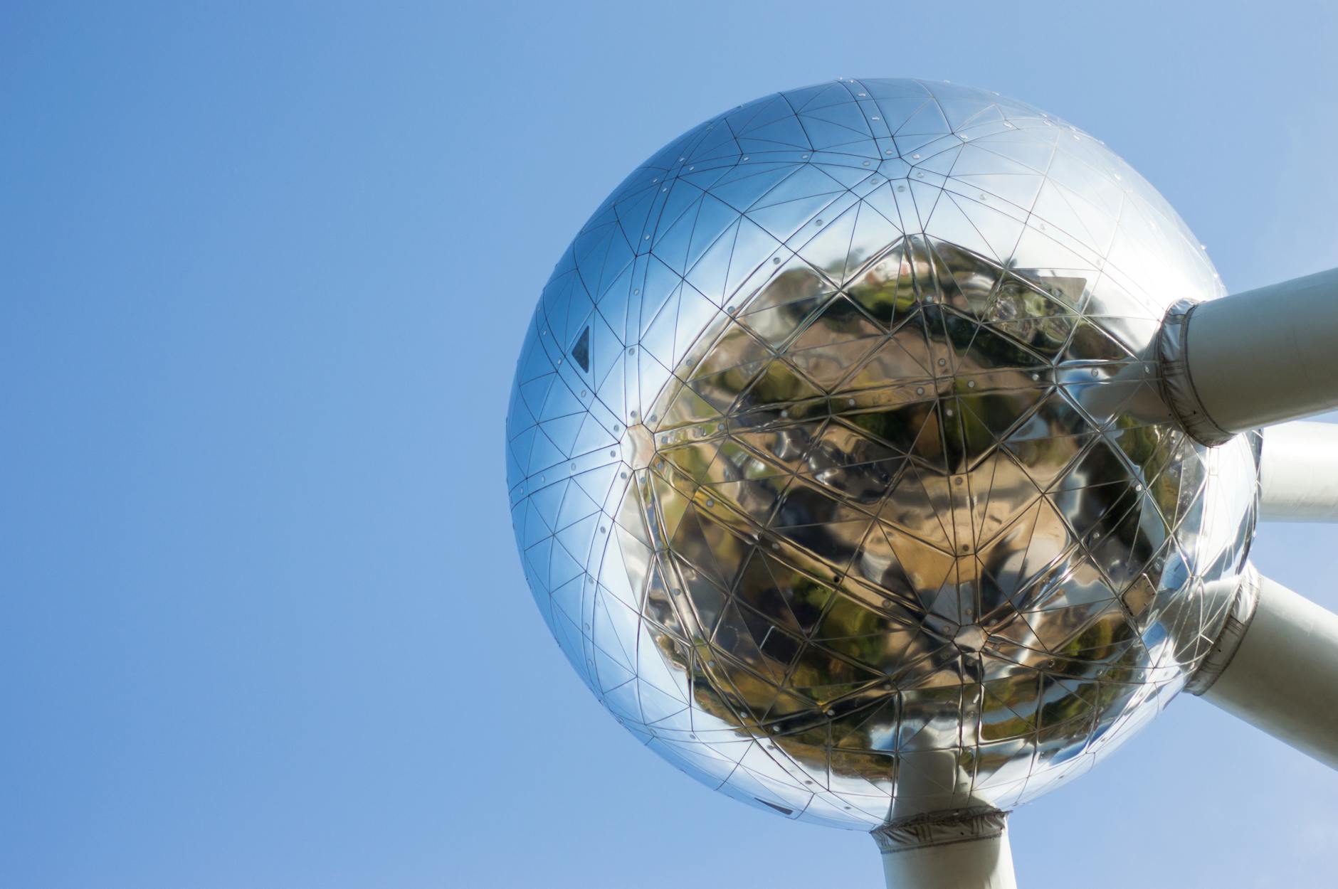 Atomium landmark in Laeken Brussels against blue sky