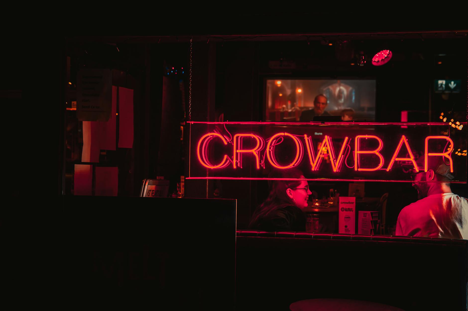 Vibrant bar scene in Brussels at night with warm lighting