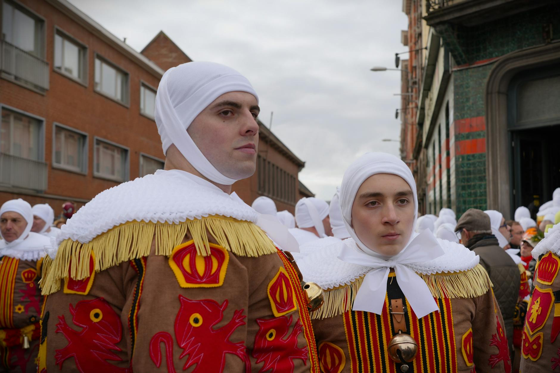 Traditional festival procession in a Belgian city square