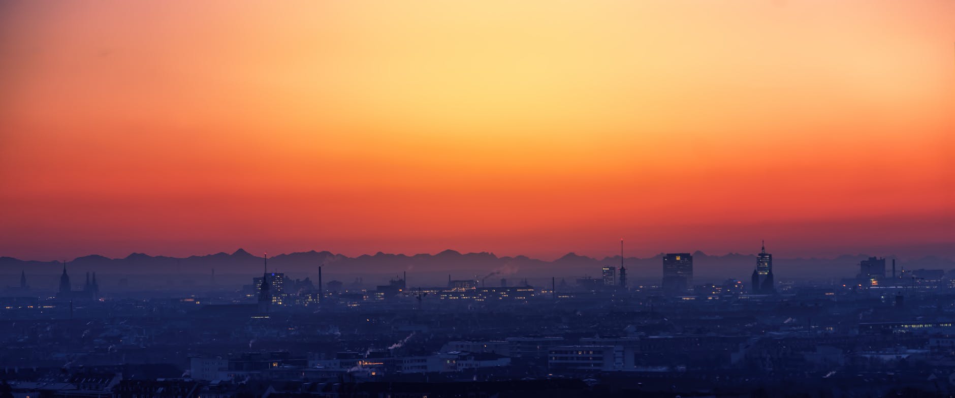 A stunning sunset panoramic view over a city skyline