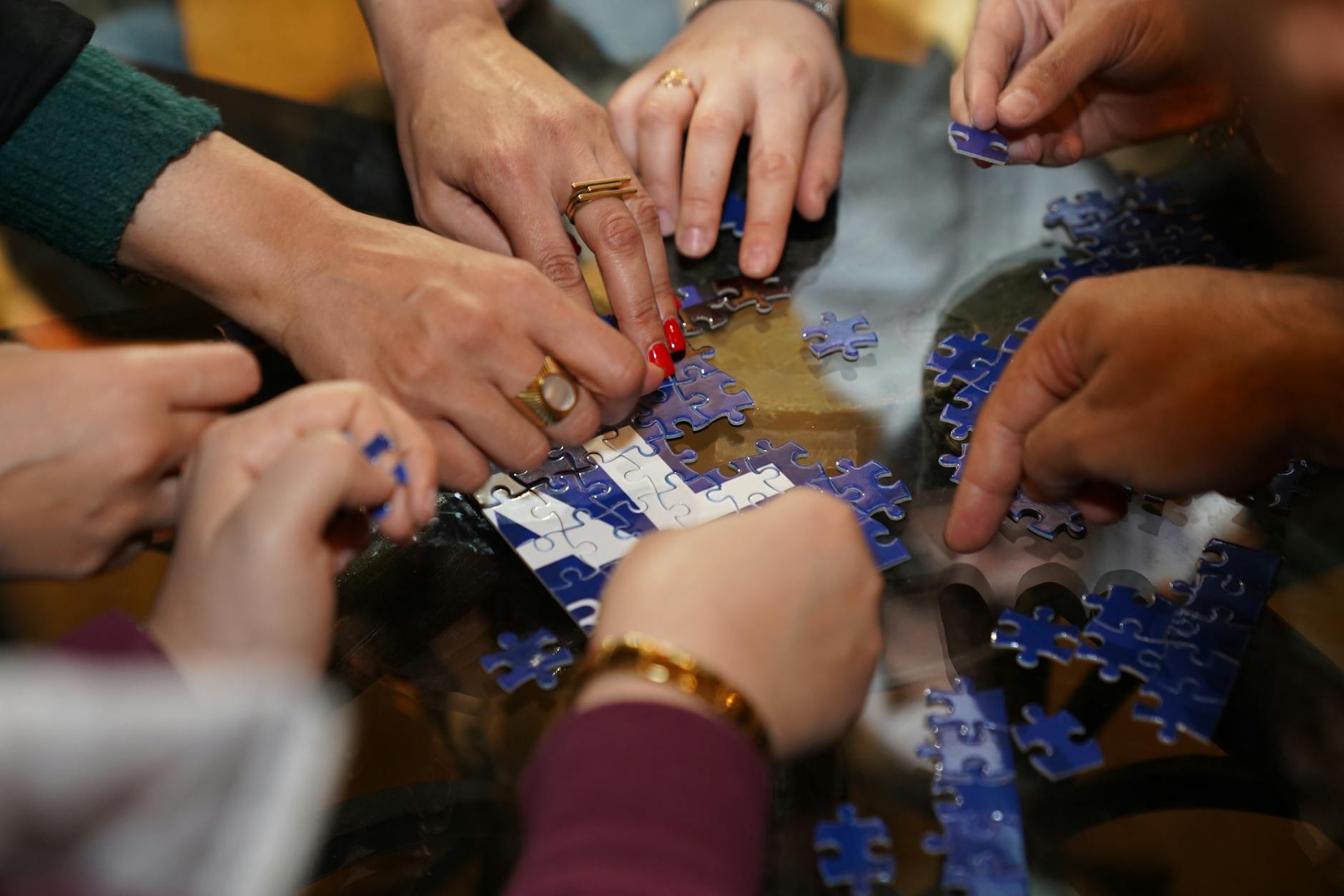 People solving puzzles together in an escape room