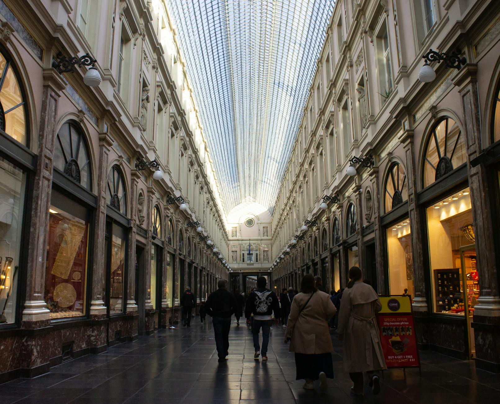 The elegant glass-vaulted Galeries Royales Saint-Hubert shopping arcade in Brussels