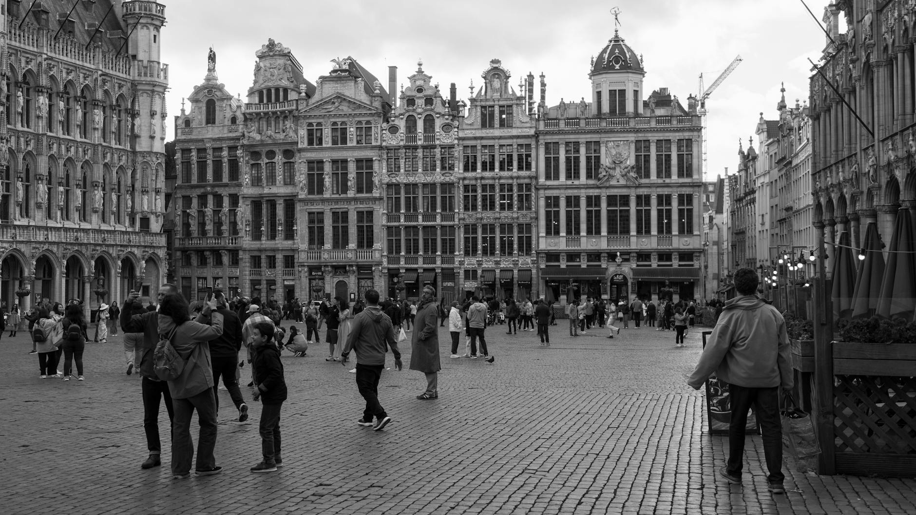 Visitors exploring the Grand Place square in Brussels