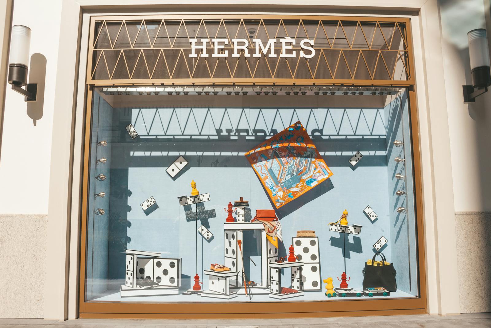 Avenue Louise luxury shopping Brussels — best luxury designer boutique window display showcasing fashion accessories