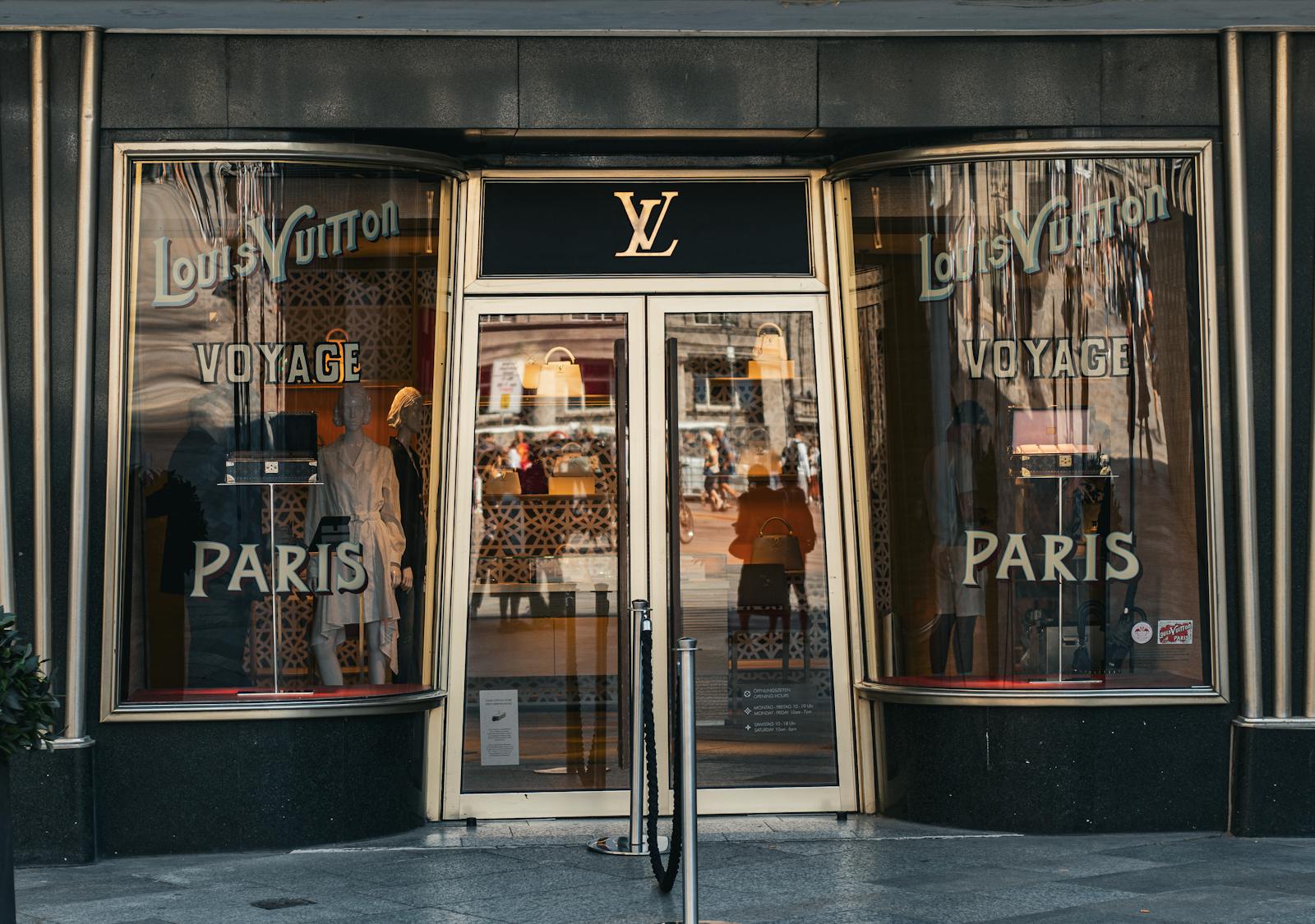 Avenue Louise luxury shopping Brussels — elegant Louis Vuitton storefront showcasing luxury fashion brand