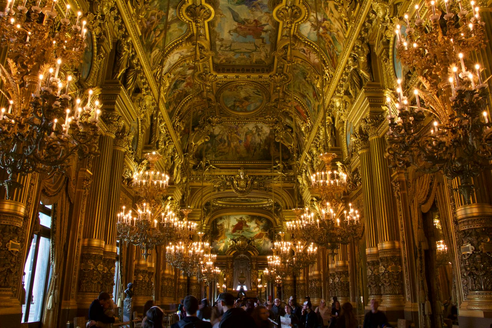 Brussels theatre performing arts — majestic opulent opera house interior with chandeliers and ornate ceiling architecture