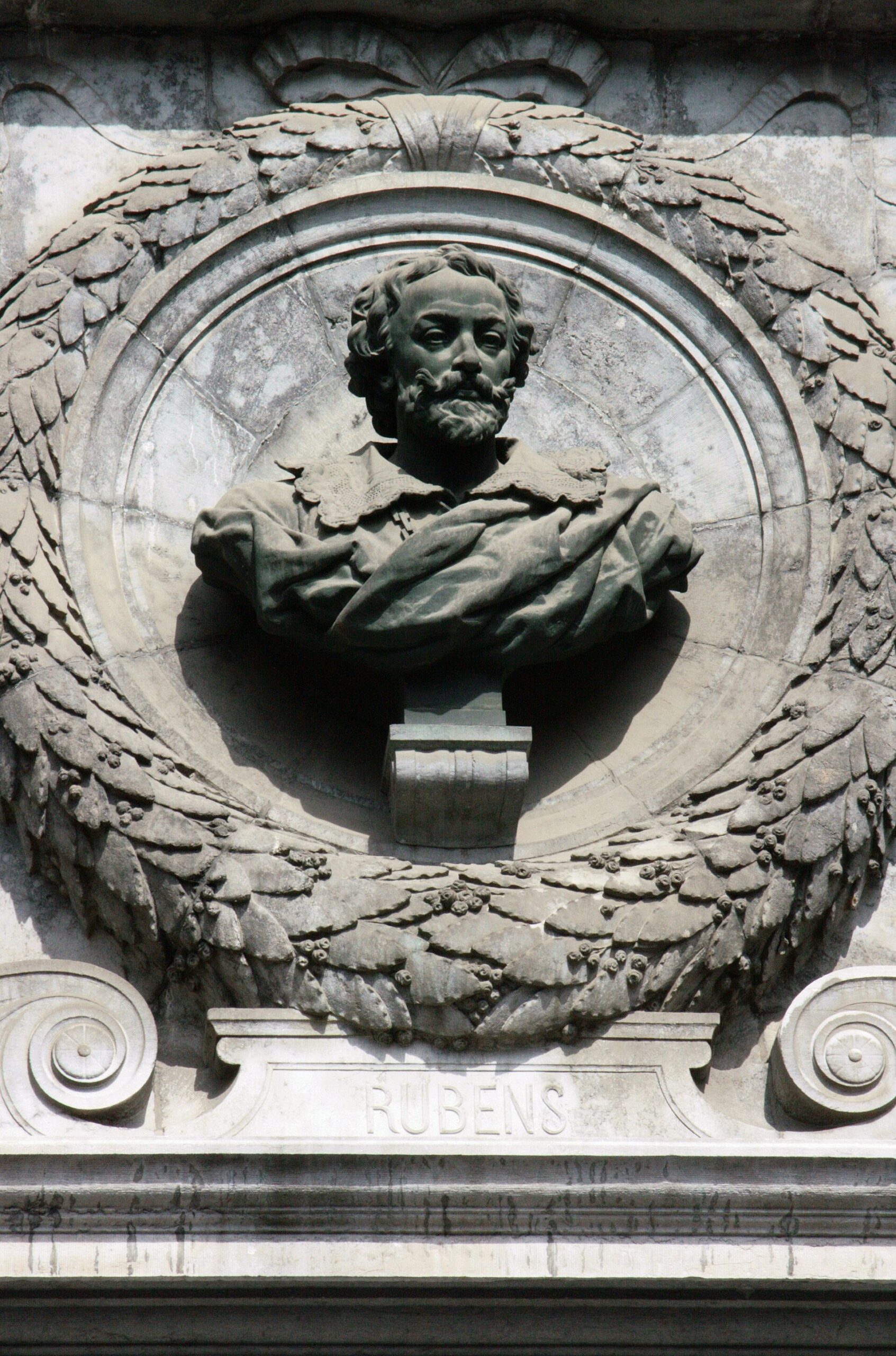 A carved stone medallion of Rubens on the facade of the Royal Museums of Fine Arts in Brussels