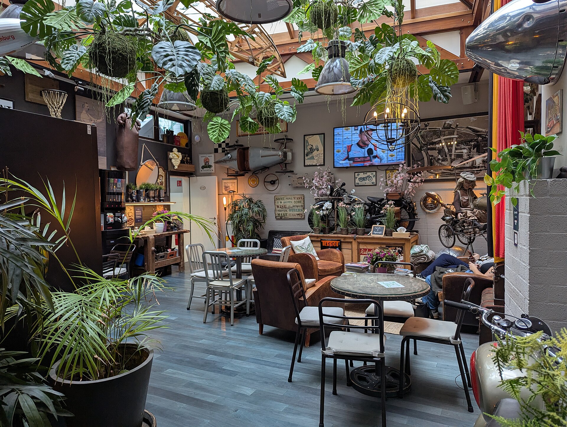 The Legacy by 2go4 City Center hostel in Brussels has a plant-filled common room with tables, leather seating and a skylight.