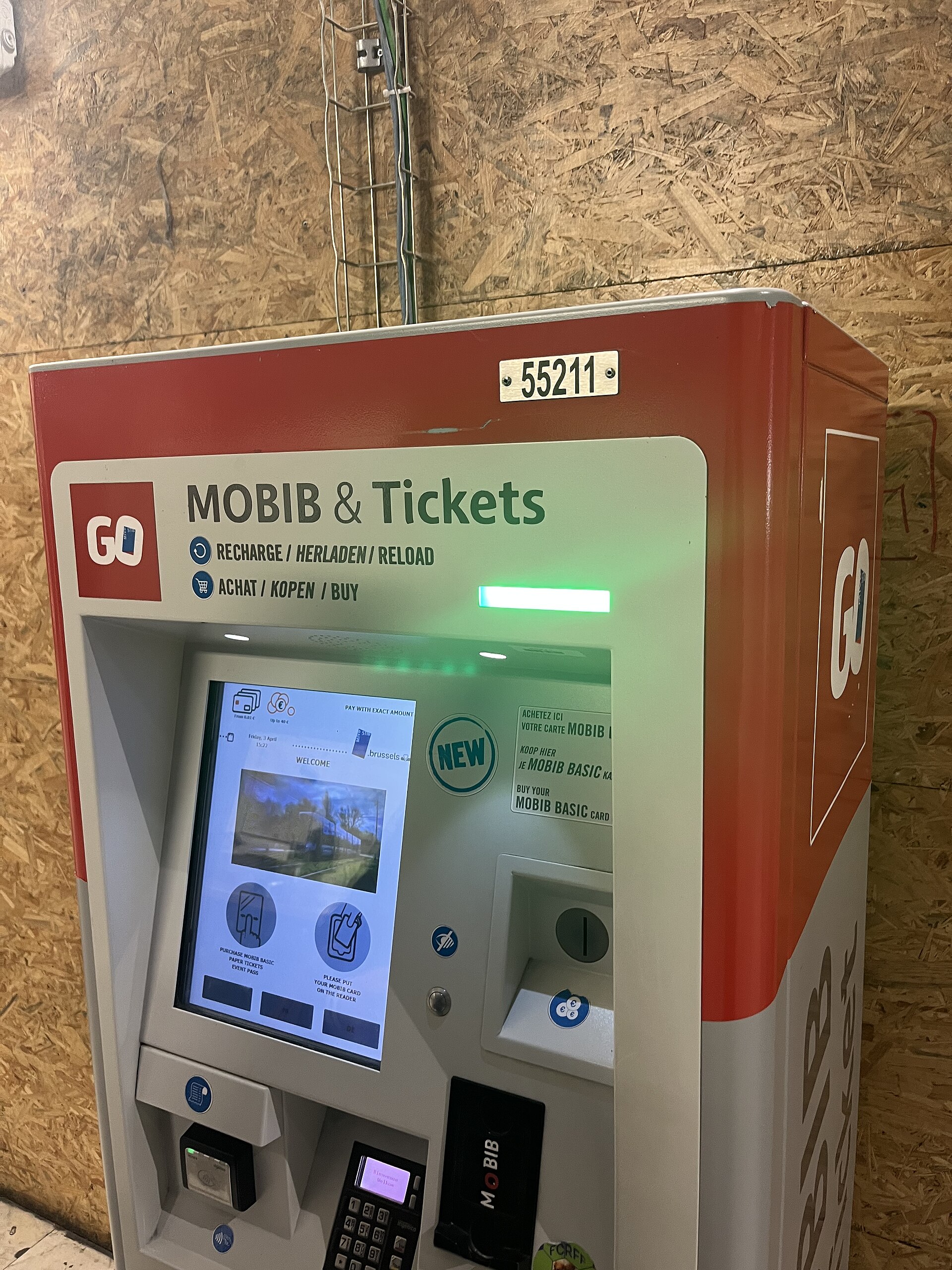 A STIB GO machine at Brussels-North displays ticket and MOBIB options beside its card reader and payment keypad.